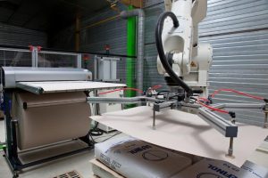 Pallet interlayer: How to successfully integrate it into an automatic palletiser